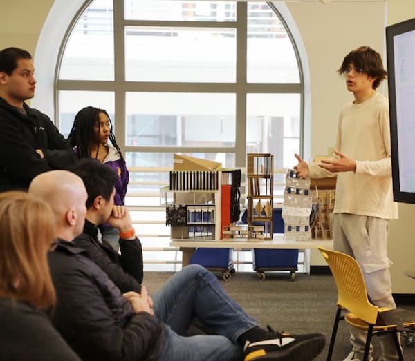A student giving a presentation.
