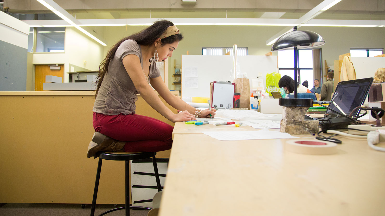 Student working on project at desk