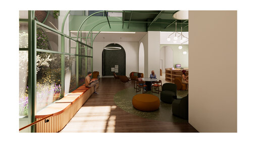 A modern seating area with large windows, green accents, and natural light.