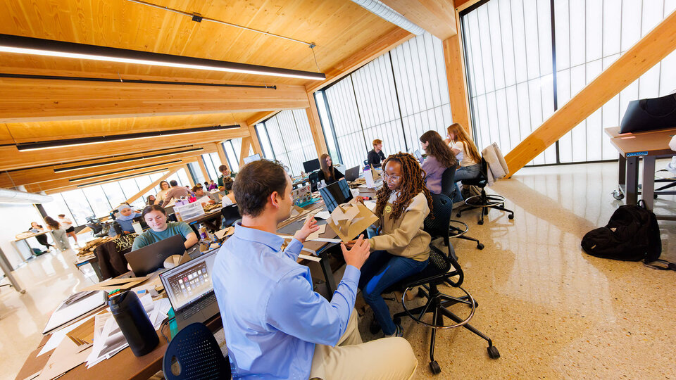 Faculty and students in new College of Architecture classroom