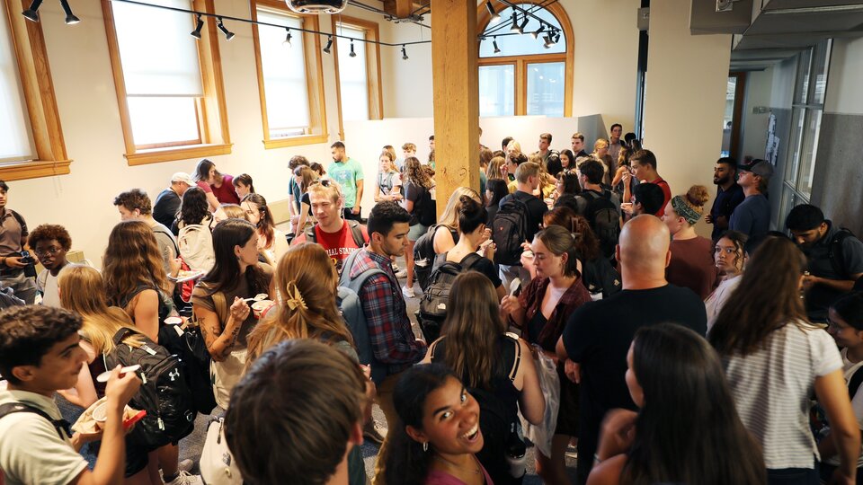 students conversing in the architecture hall