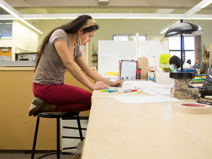 Student working on project at desk