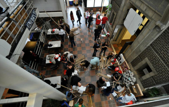 an arial view of students working on an architecture project